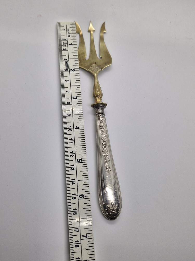 Vintage Antique brass fork with silver handle