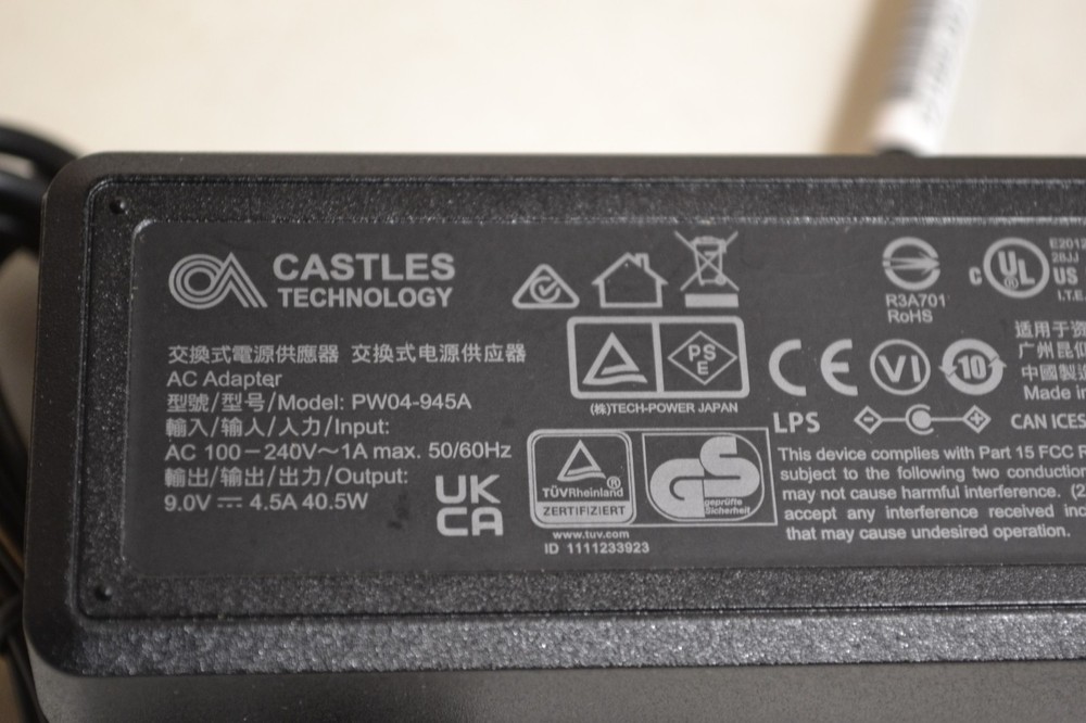 Castles Technology AC Adapter Model: PW04-945A