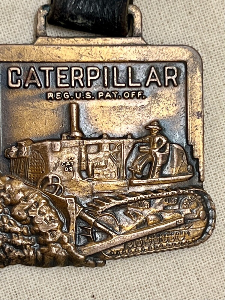 1960’s Caterpillar D9 Brass Medallion With Leather Belt Loop