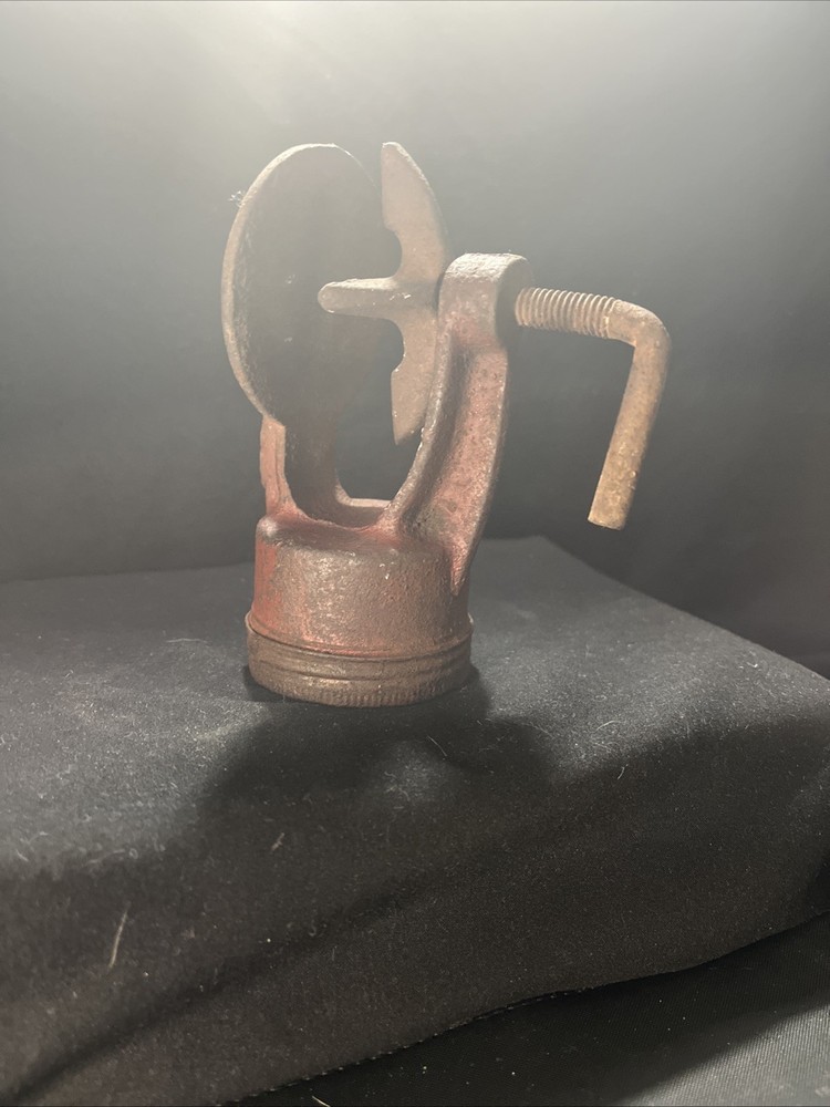 antique cast iron hand water pump, also known as a pitcher pump