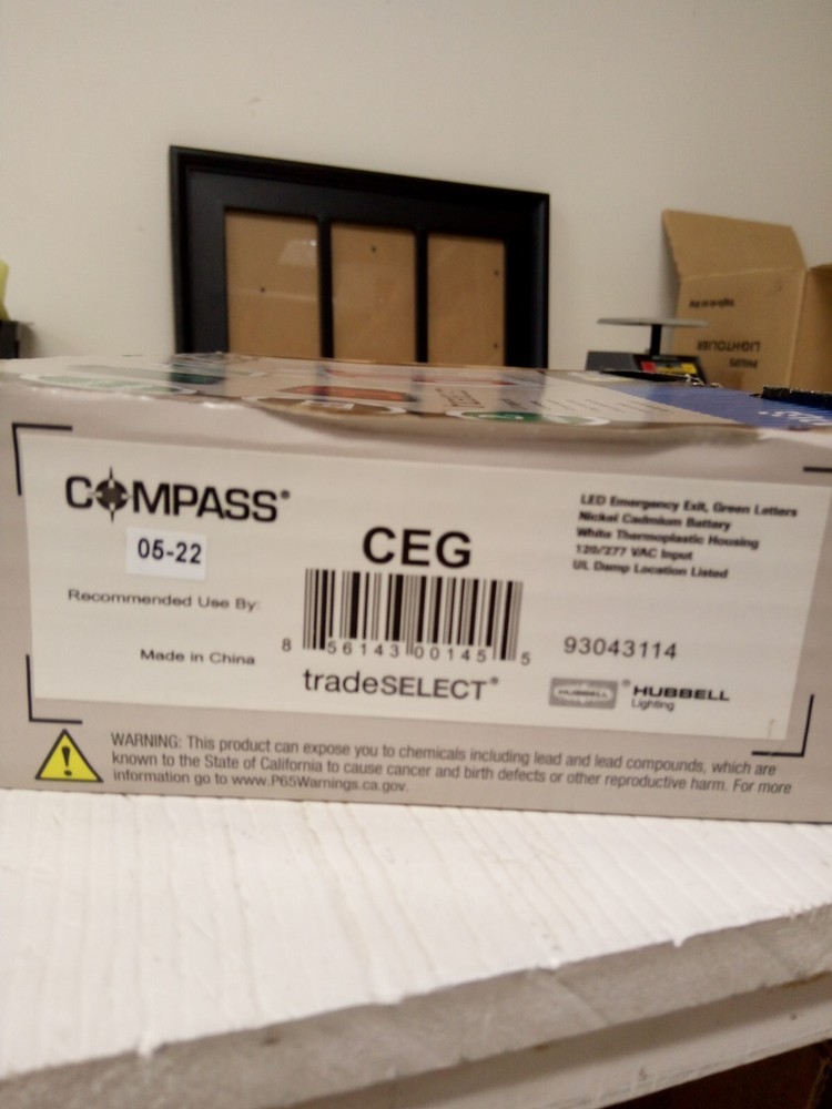 HUBBELL COMPASS CE SERIES LED EMERGENCY EXIT SIGN. NEW IN BOX