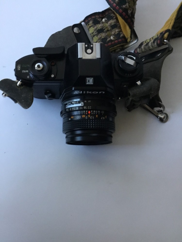 NIKON EM 35mm Nikon Camera With Case.