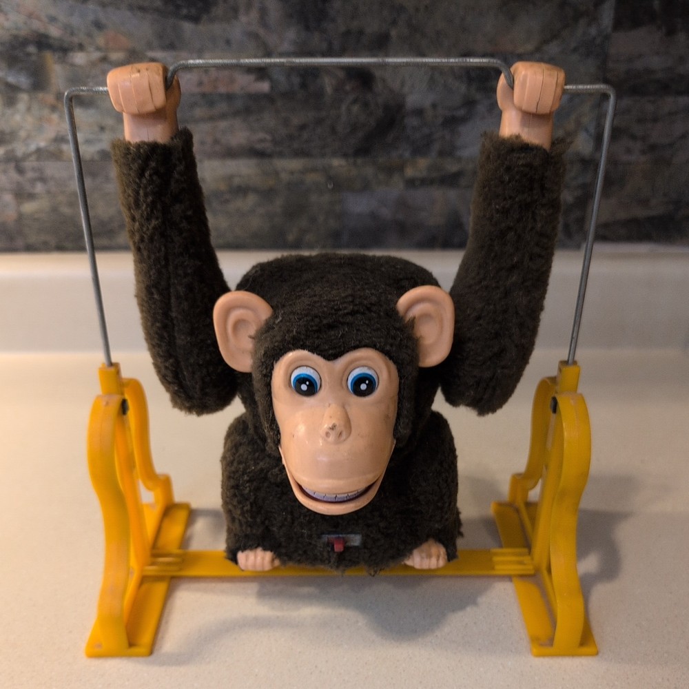 Antique Collectable Swinging Monkey ( Battery compartment needs cleaning)