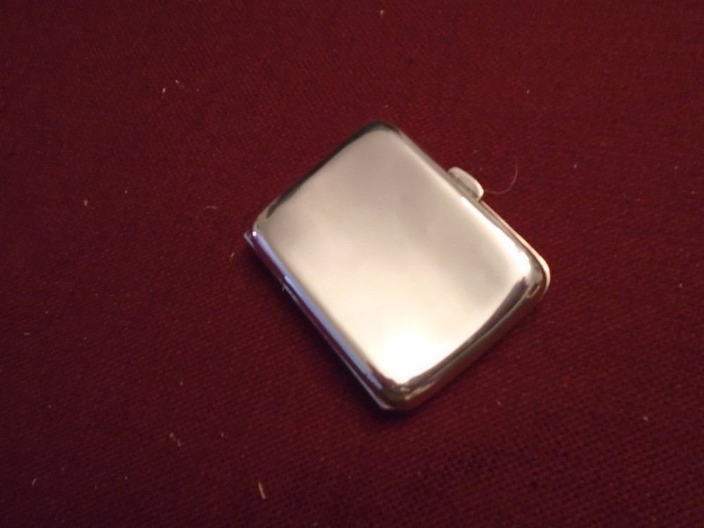 ANTIQUE STERLING SILVER CARD CASE.