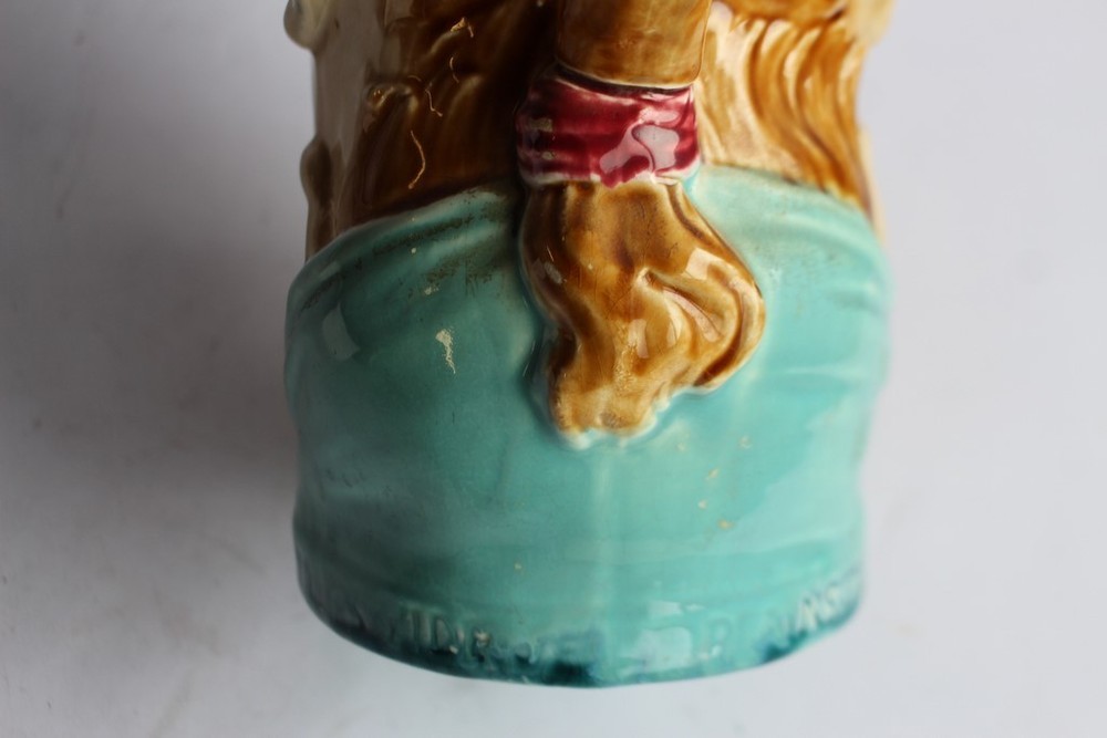 Sarreguemines slipware pitcher with double faces (39486)