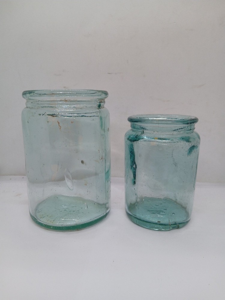 2 Old Different Size Glass Jars
