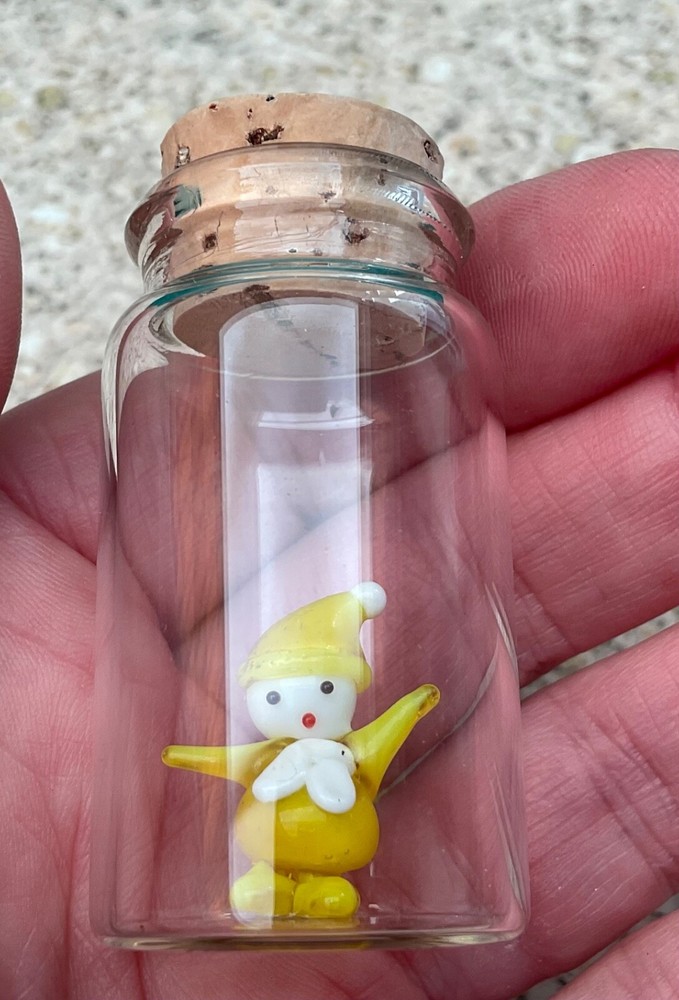 Miniature pulled glass yellow figurine in corked Glass Bottle GC