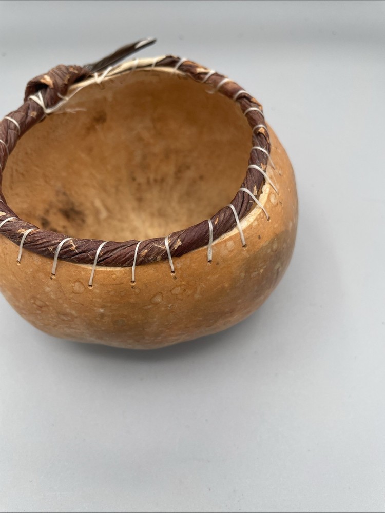 Handcrafted Native American gourd basket with feather & abalone shell. 5”