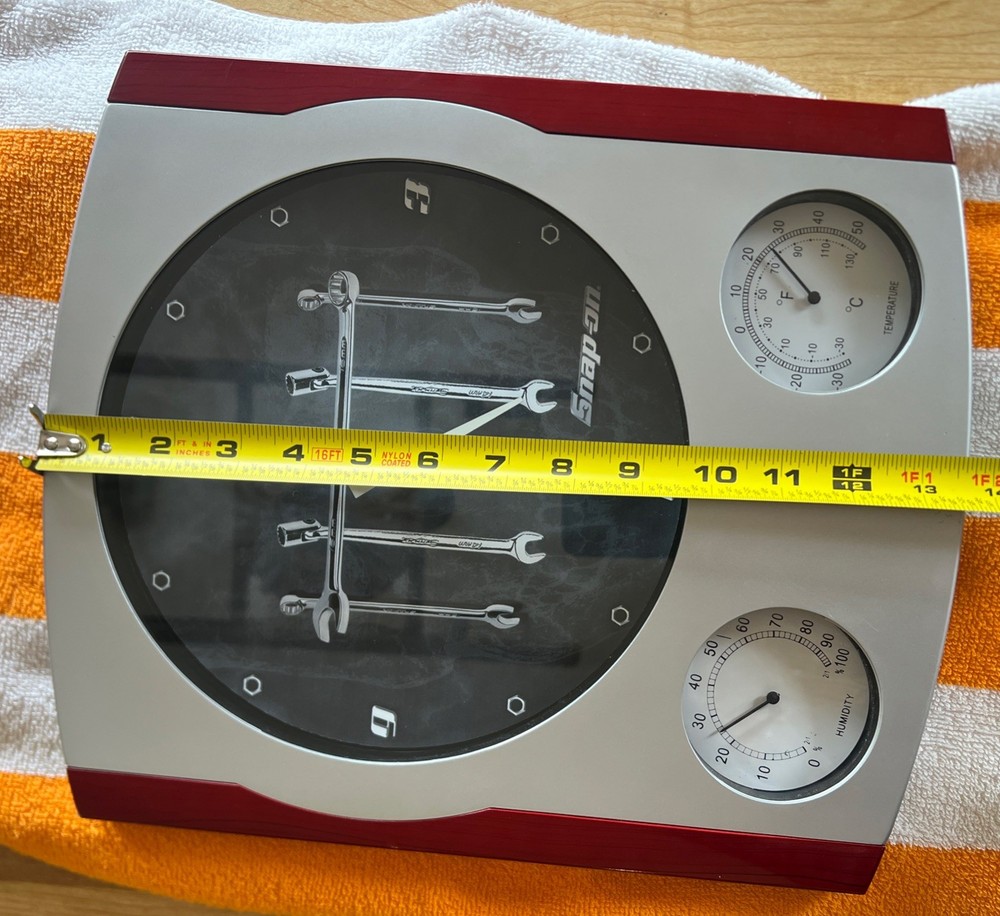 “Snap-on wall clock thermometer hygrometer