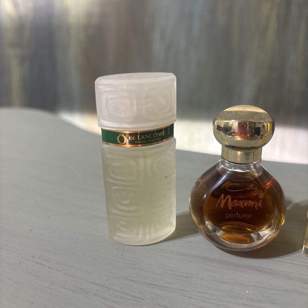 4 Vintage Mini perfume bottles. 3 Never Used, 1 Refil Case/ Bottle Empty.
