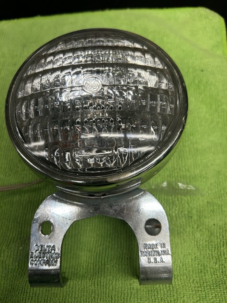VINTAGE DELTA SEALED BEAM HEAD LIGHT AND HALF BATTERY BOX