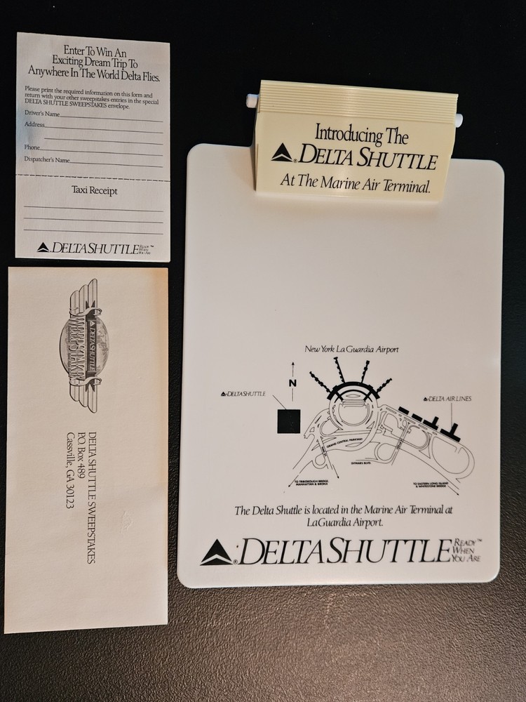 Delta Air Lines Delta Shuttle Clipboard With Marine Air Terminal Map.