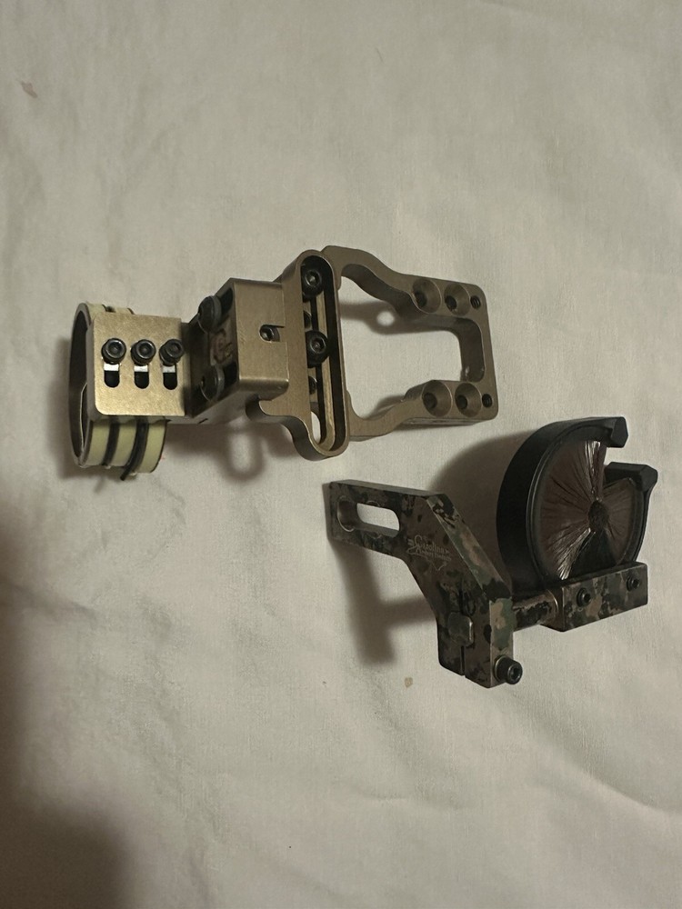 archery sight and arrow rest left