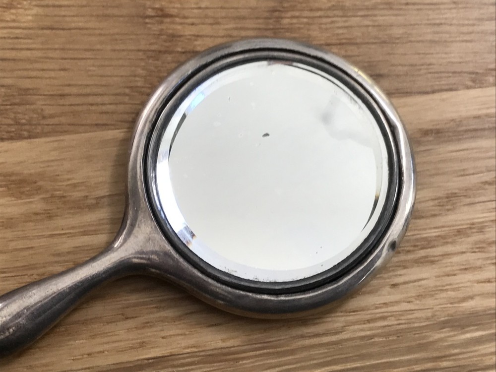 nice looking small size solid silver vanity mirror