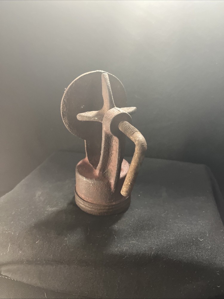 antique cast iron hand water pump, also known as a pitcher pump