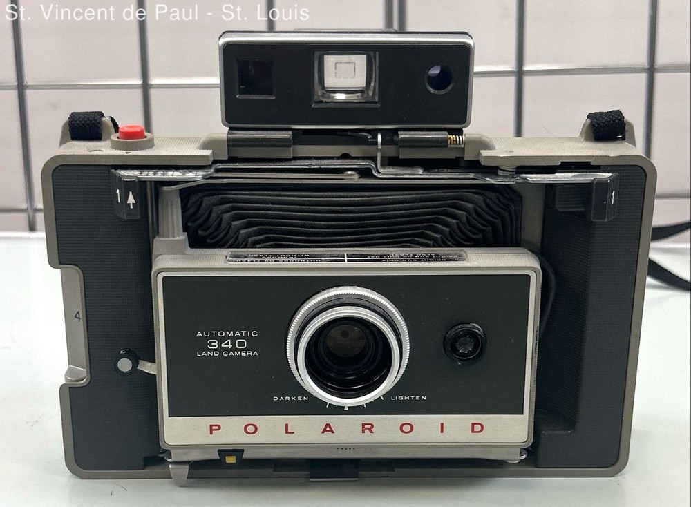 Vintage Polaroid Automatic 340 Land Camera Silver Folding -Pre-Owned -Not Tested