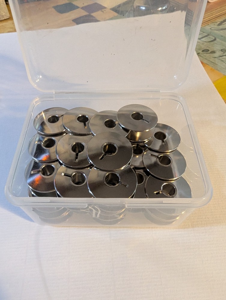Lot of 40 Metal Sewing Machine Bobbins