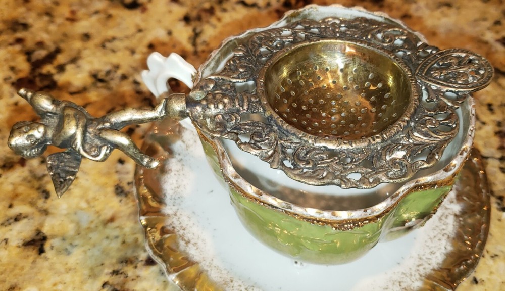 Ornate Antique Tea Strainer - Etched - Unknown Origin - see pics Cherub handle