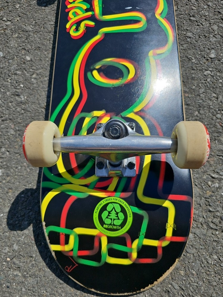 Almost Skateboards Complete Rasta Neon Logo Deck Tensor Trucks