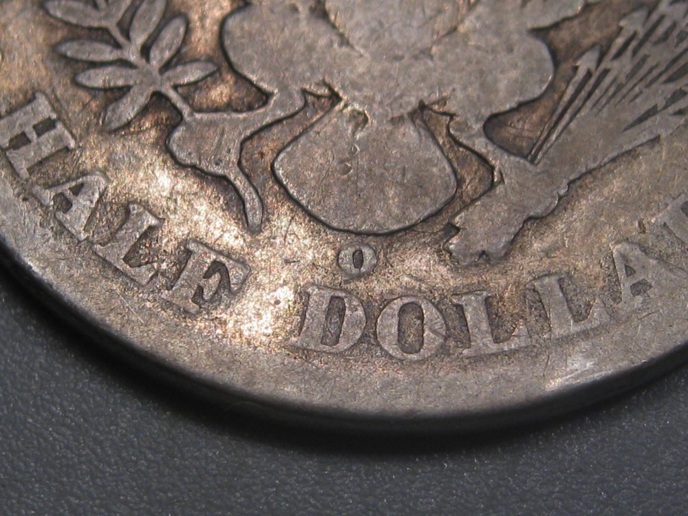 Better-date 1896-o Silver BARBER Half Dollar.