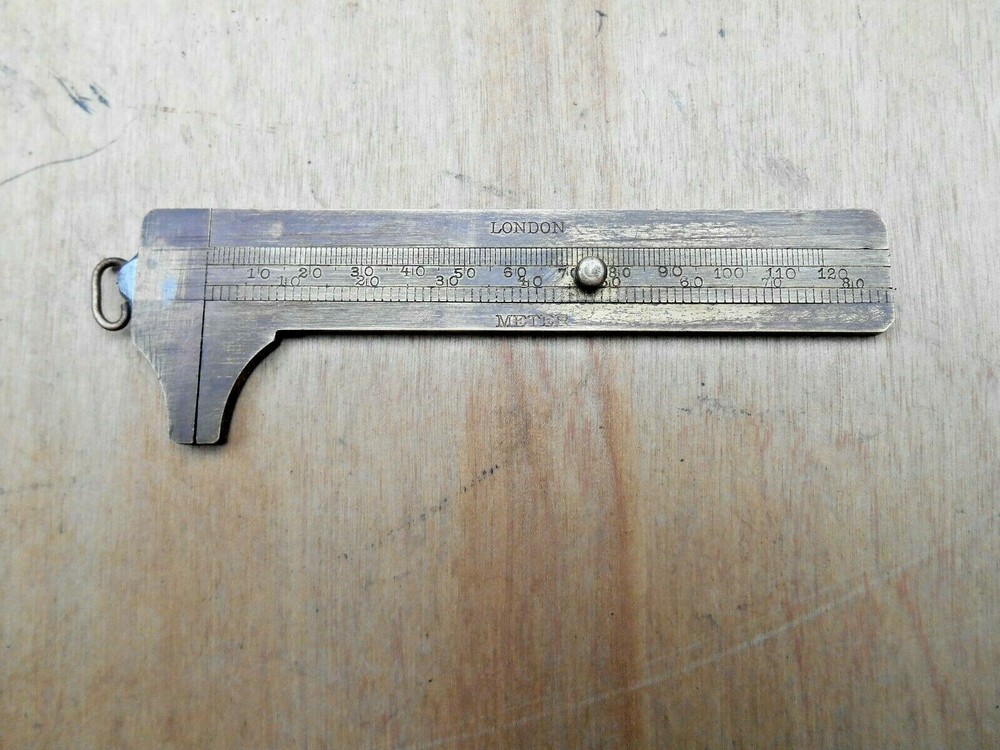 SOLID BRASS POCKET CALIPER , LONDON , PEERLESS SILK DYING CO. PHILADELPHIA , ADV