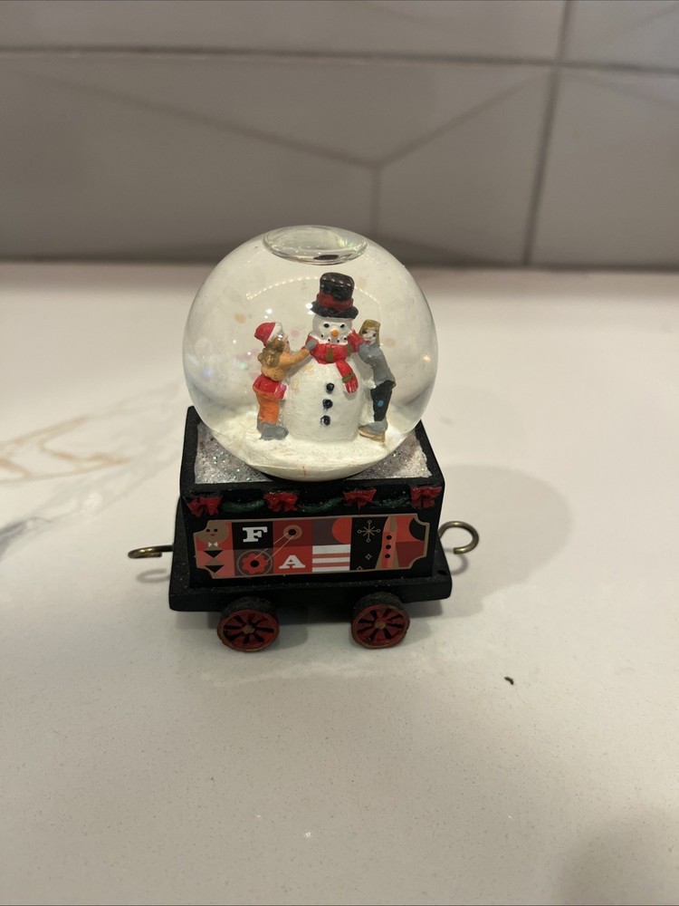 F.A.O SCHWARZ 4- piece Train Snow Globe Set
