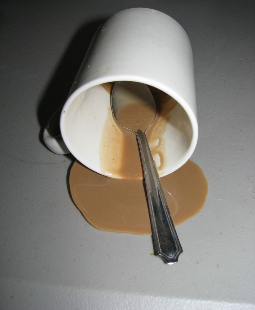 Fake Spilled Coffee Mug Display with Spoon
