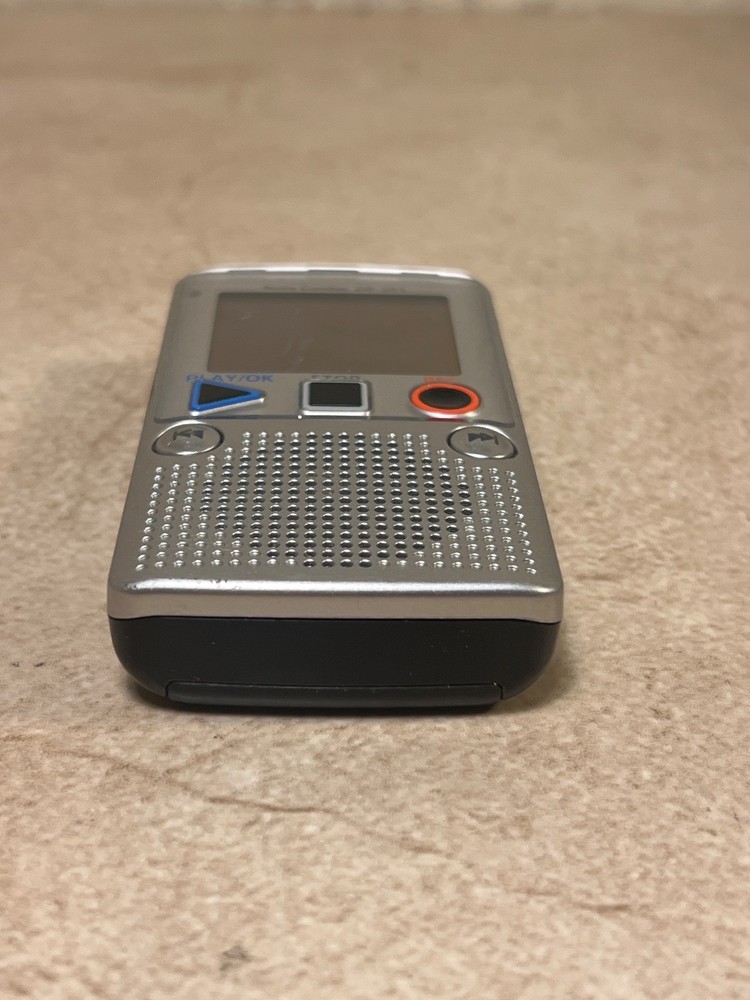 Olympus DP-201 digital voice recorder.