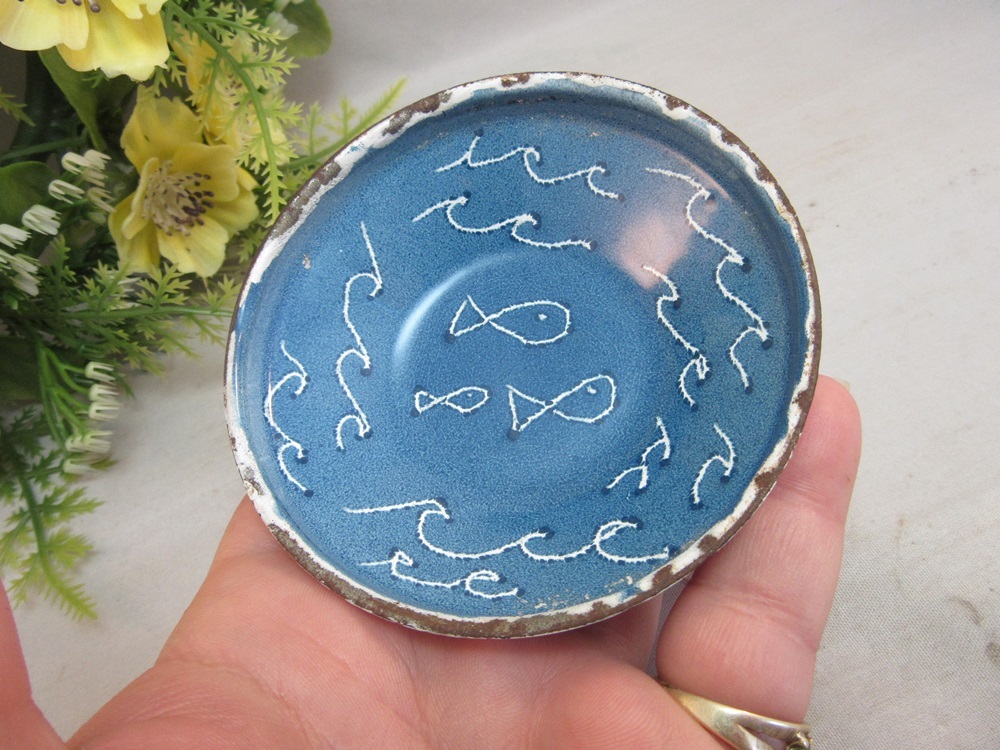 Mid Century enameled dish with fish. Signed WEST