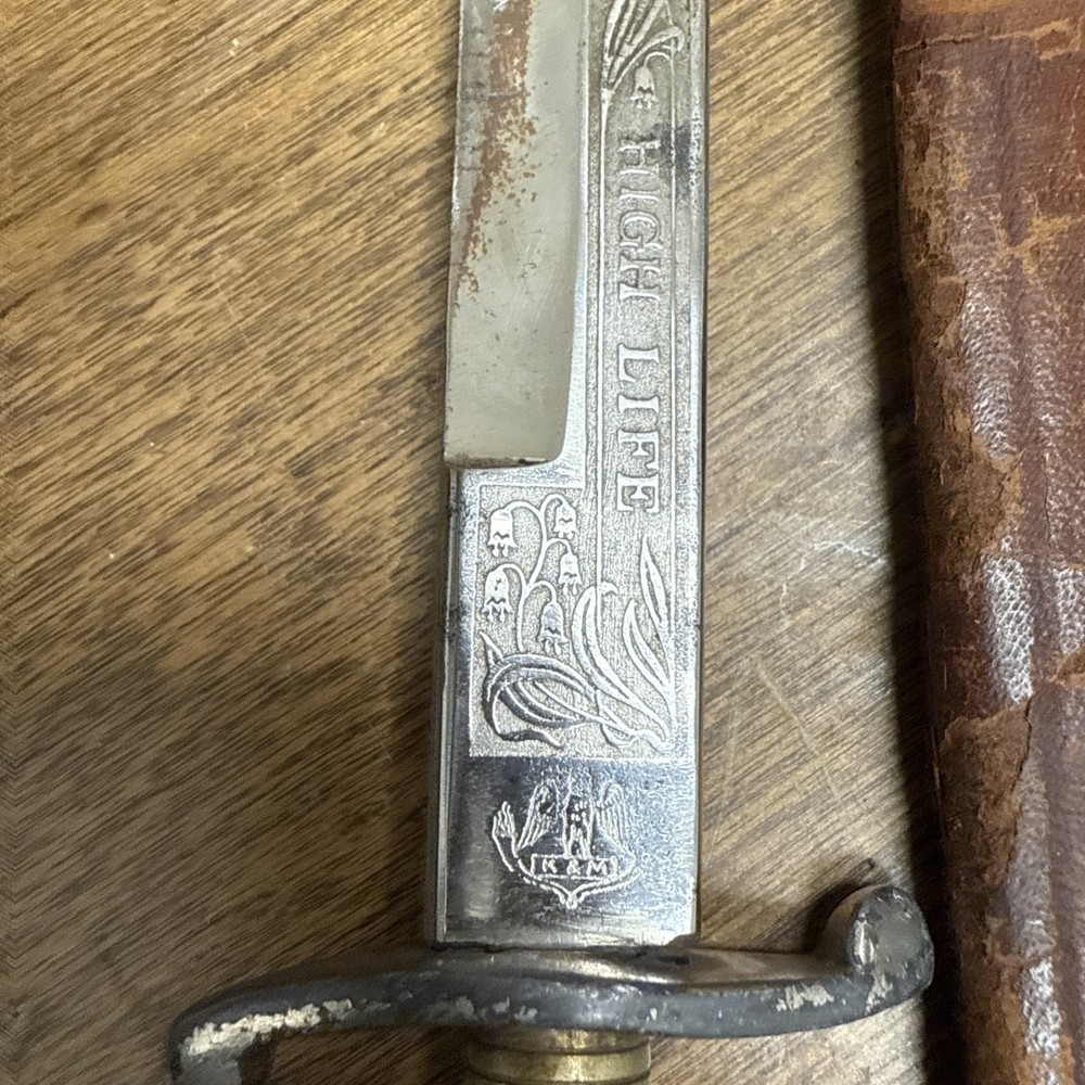 A GERMAN SOLINGEN DAGGER WITH ENGRAVED BLADE