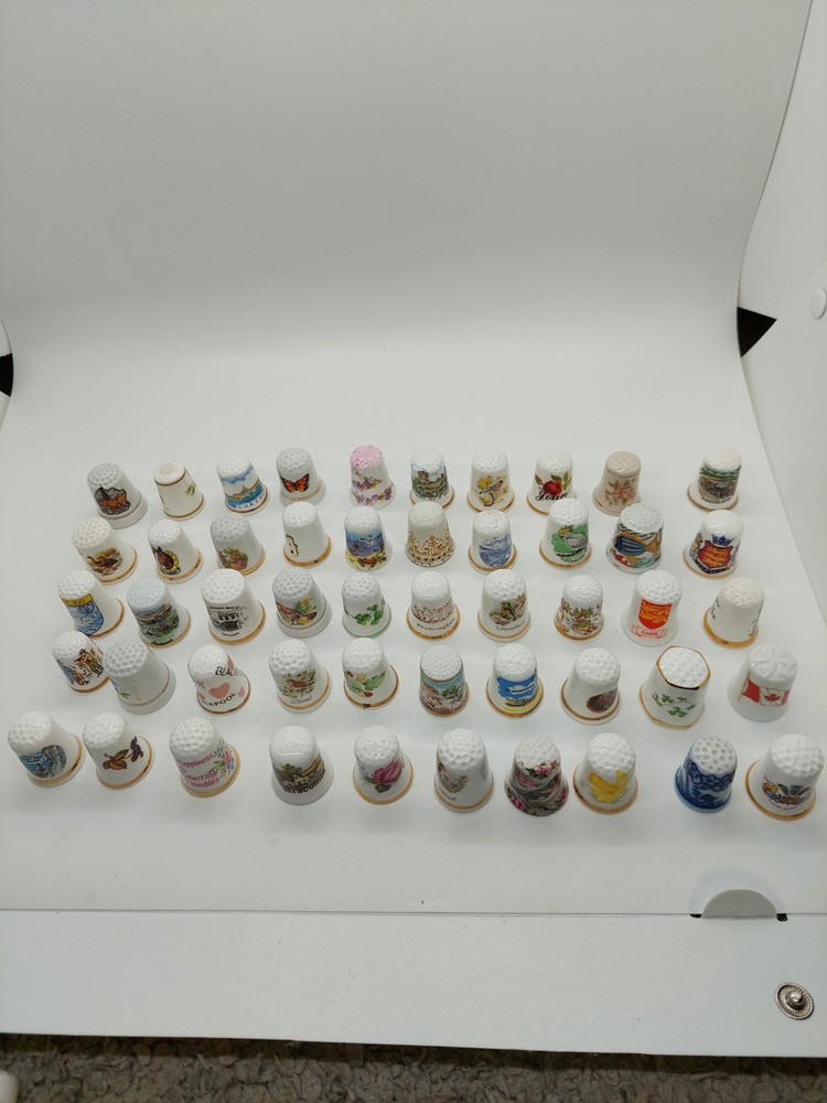 Massive bundle of 50 vintage thimbles
