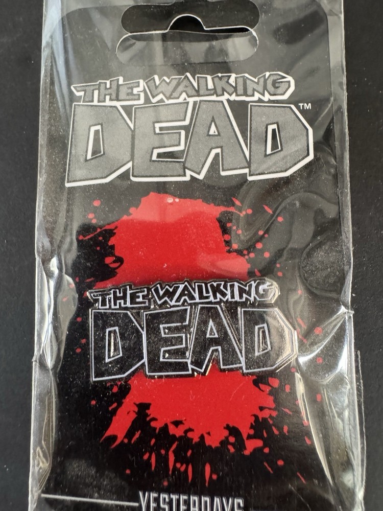 Enamel pin featuring The Walking Dead comic book logo Skybound