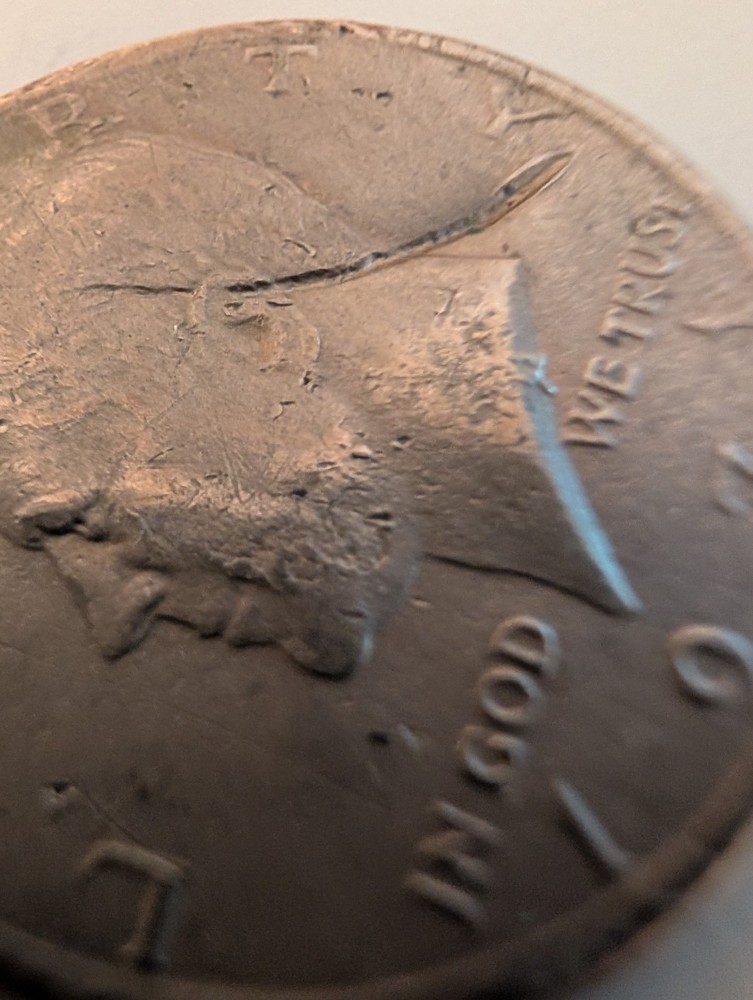 1971 Half Dollar Struck Through Wire And Error On His Cheek