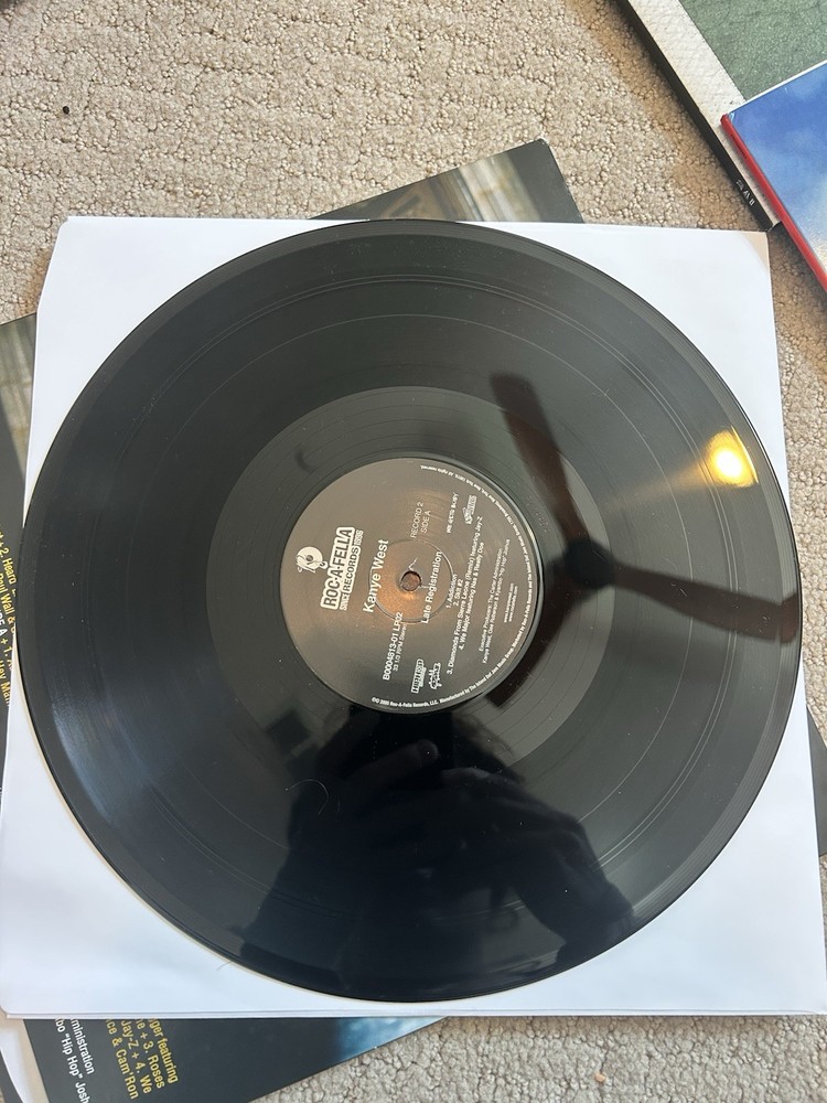 Record Player + 7 Vinyl Records + Cleaning Kit. See Description
