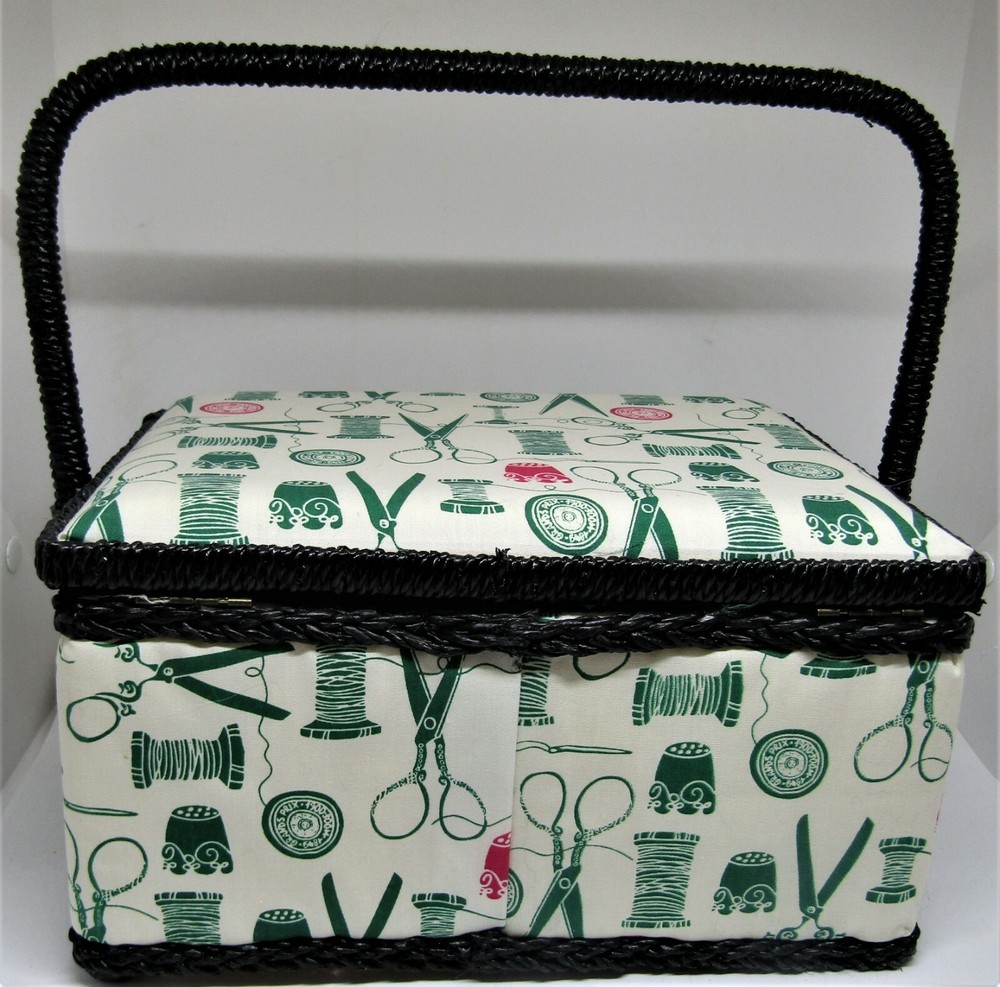 Sewing basket with handle and insert.