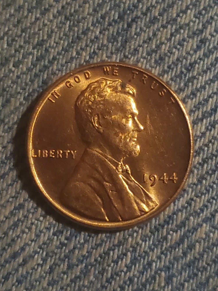 1944 no mint mark L rim error