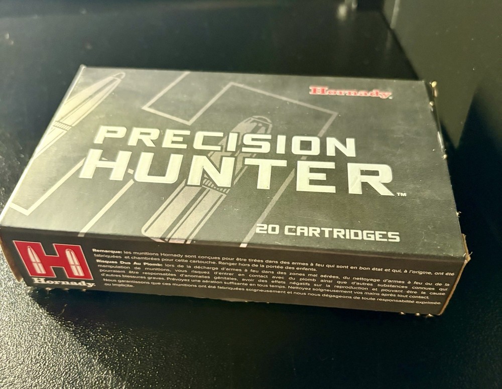 Various empty cardboard ammo boxes.