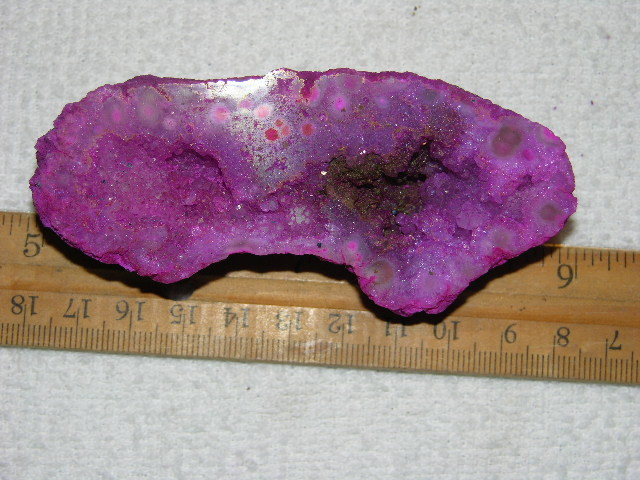 Geode cut & polished half with colored crystal center 4 inch E36