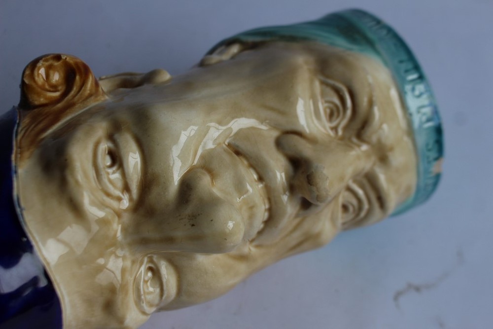 Sarreguemines slipware pitcher with double faces (39486)