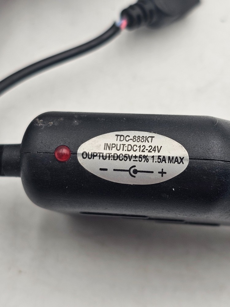 XTREME dash camera along with automobile plug in and wire