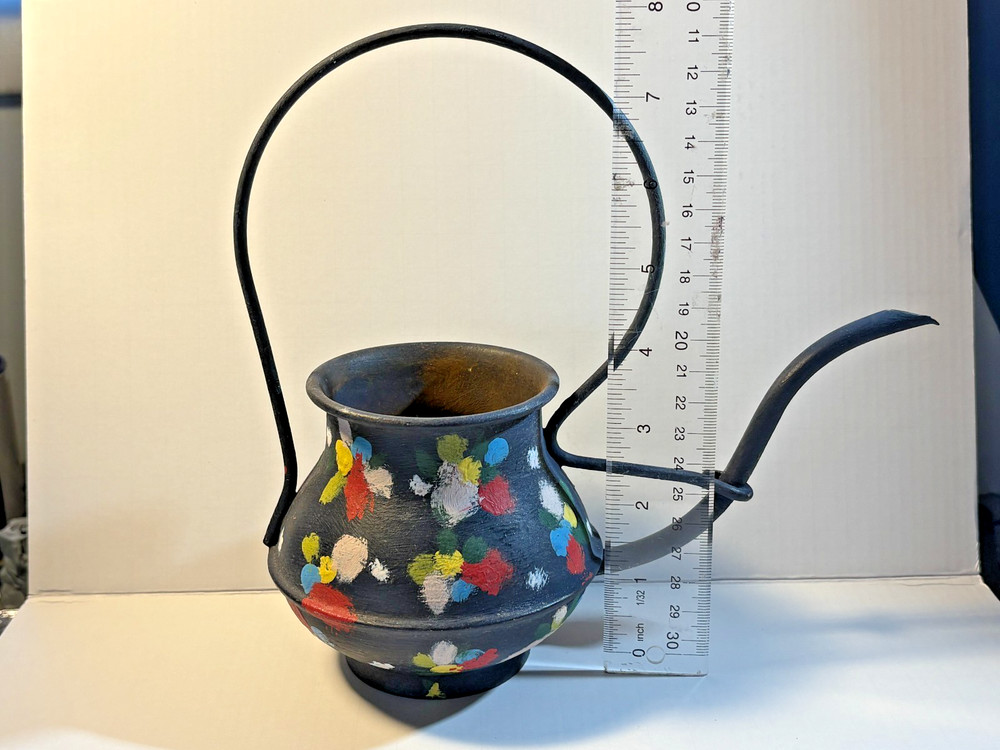 Hand painted decorative copper watering can. 8" tall. Light rust inside.