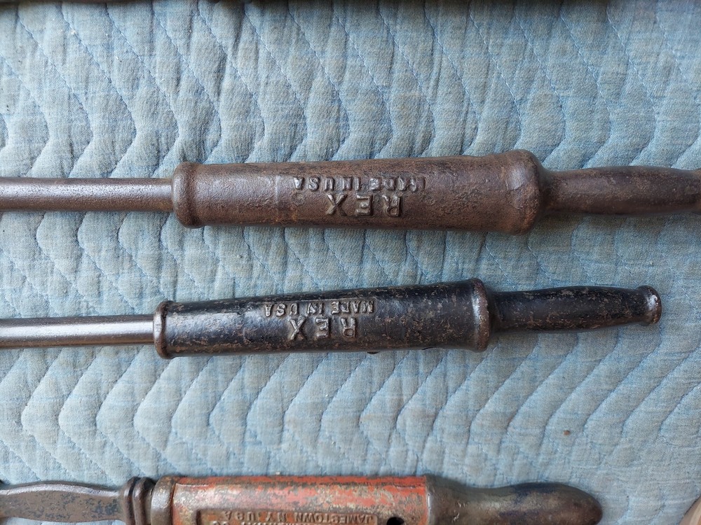 Collection of 8 different antique nail pullers