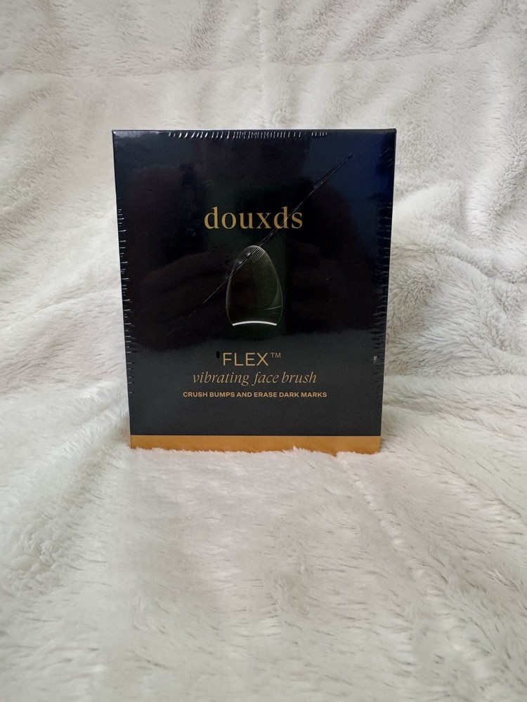 douxds FLEX™ Pro Vibrating Face Brush designed for skincare.