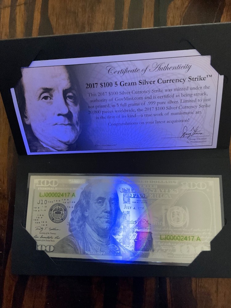 2017 $100.00 5 gram currency strike with pen.