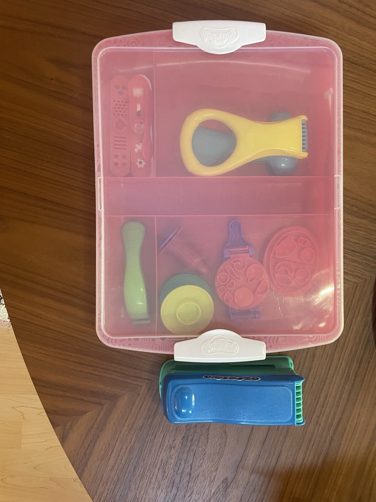 Random Play-Doh accessories including container
