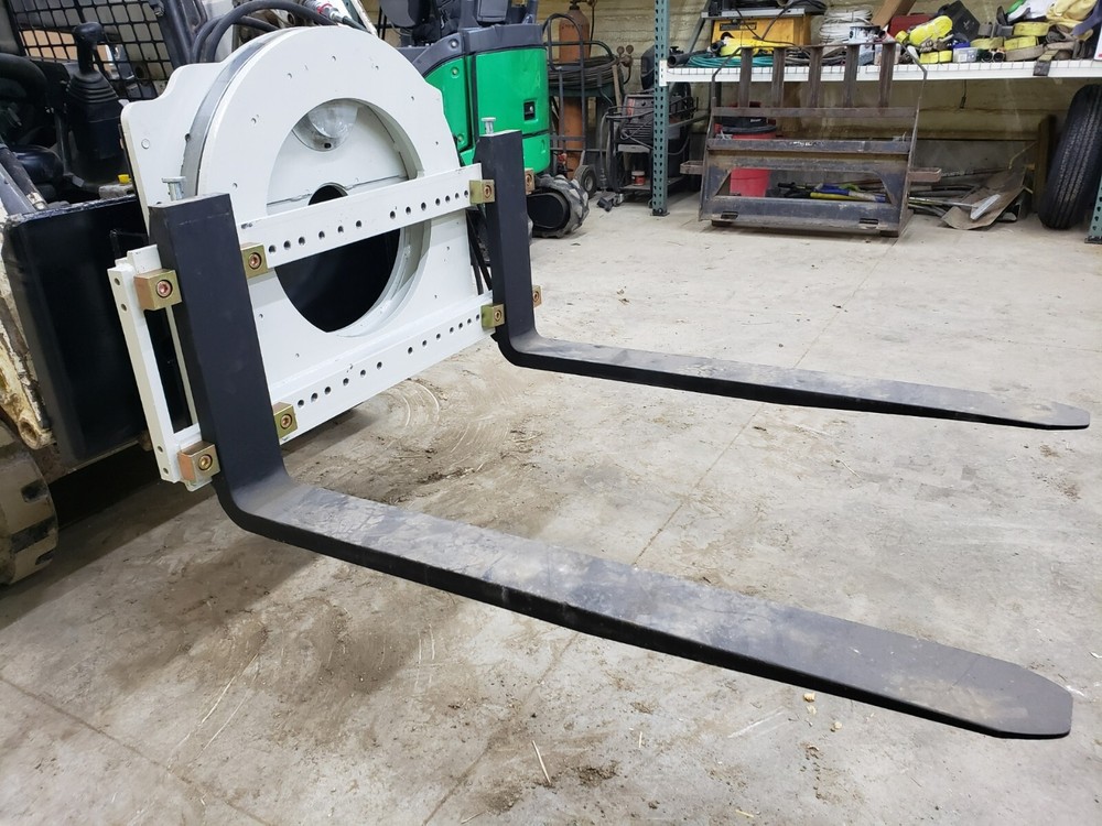Skidsteer Bobcat fork rotator--- NEW WITH WARRANTY!!!
