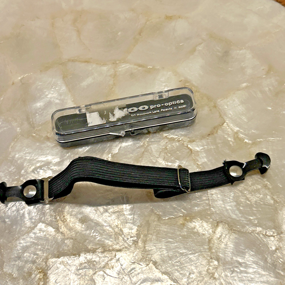 pro-optics adjustable eyewear retainer strap in plastic case New