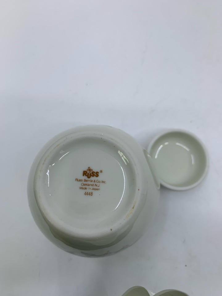 WHITE SMALL GINGER JAR W/ PINK FLOWERS.