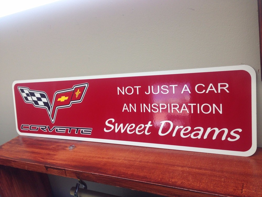 Red Corvette metal sign 6" x 24"