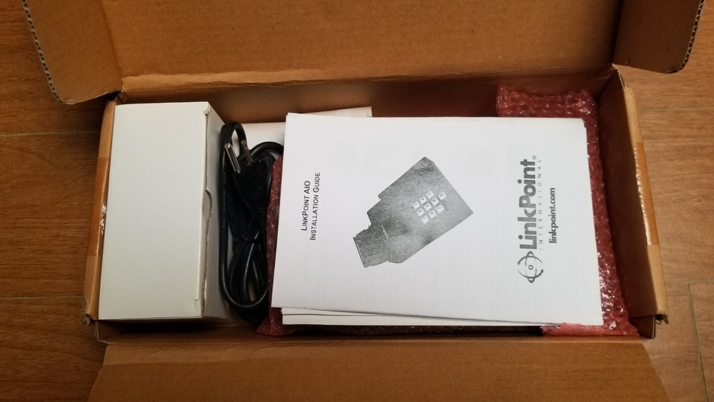 LinkPoint A10 Credit Card reader with power supply, extra papers.